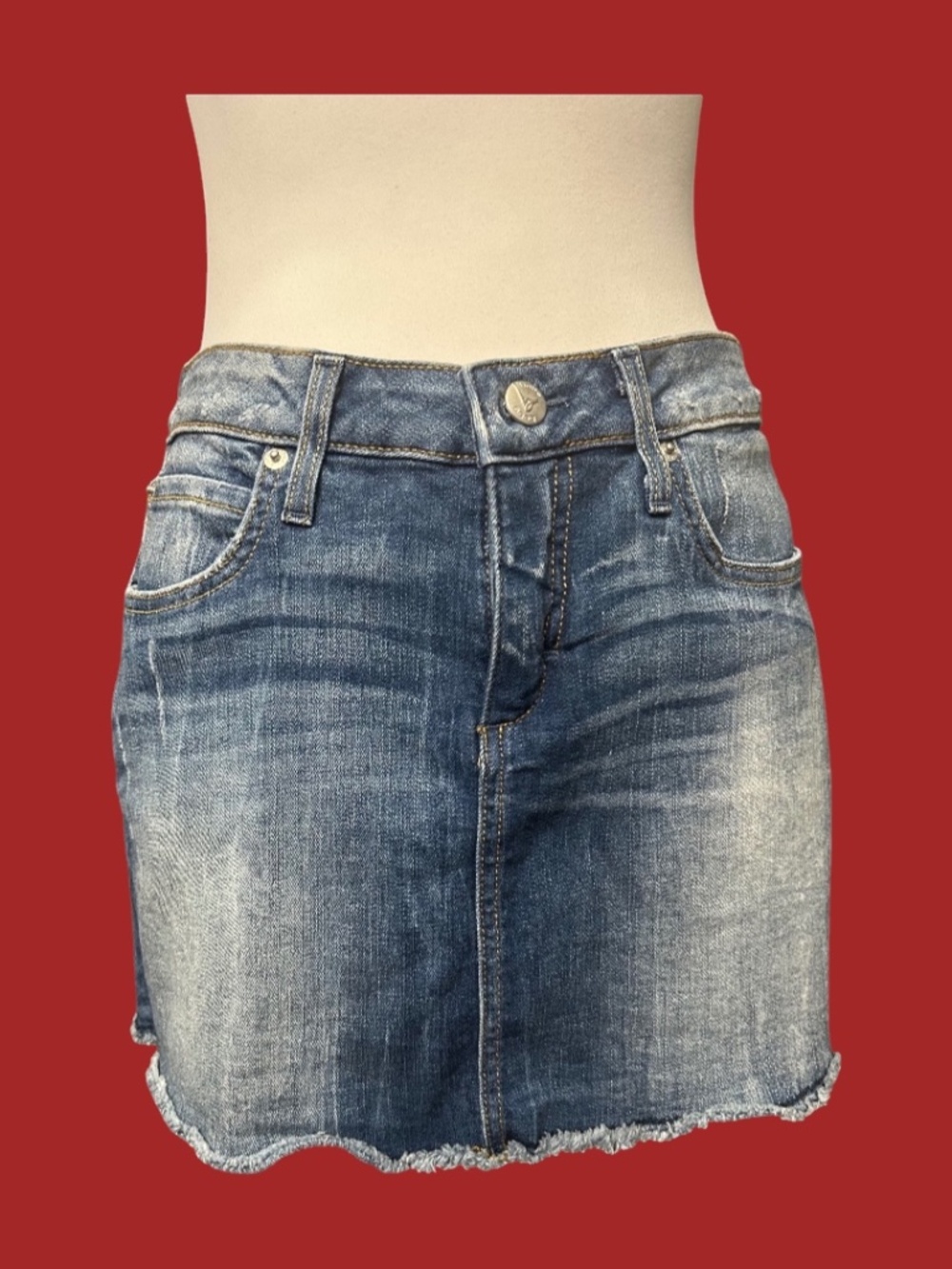 Bebe Distressed Denim Mini Skirt